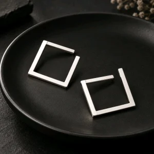 Stainless steel open square geometric hoop earrings in a polished finish.